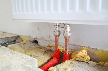 To lower energy costs a new heating is installed. The floor is open you can see tubes and insulation materials