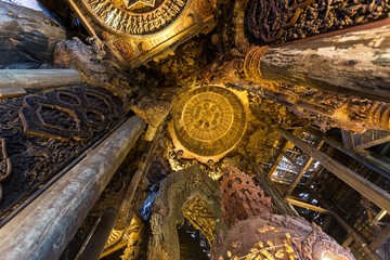 Fototapeta na wymiar Interior of a wooden Buddhist temple