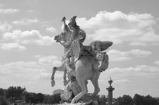 Fototapeta Ancient sculpture in Paris over the sky in black and white