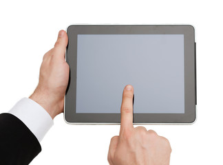 close up of man hands touching tablet pc
