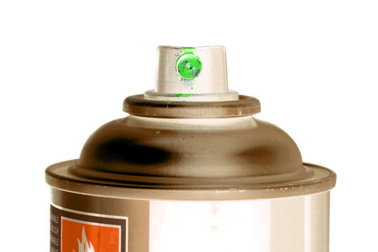 Fototapeta Sprühkopf einer Spraydose (Grüner Lack) freigestellt vor weißem Hintergrund