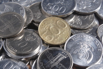 coin rupiah at wooden table