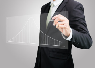 Businessman hand drawing a graph Isolated