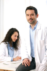 Portrait of a doctor and a nurse working