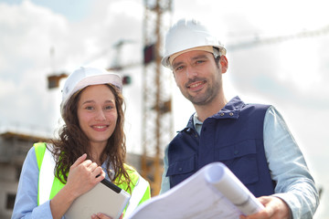 Co-workers working on a construction site