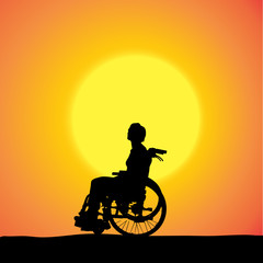 Fototapeta na wymiar Vector silhouettes of woman in a wheelchair.