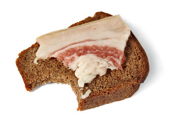 salted pork fat and Borodinsky rye bread isolated on white