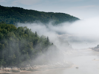 Fog over river, Quebec, Canada
