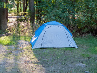 Camping tent in a forest