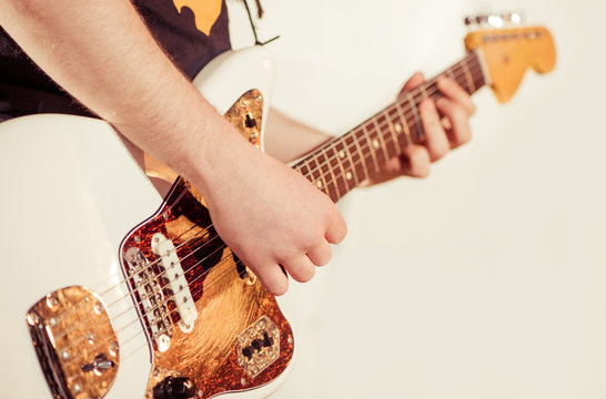 male musician with electric guitar