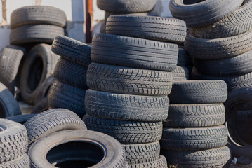 Obraz premium Pile of old used car tires