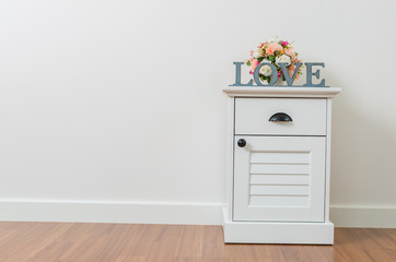 Love sign on bedside table