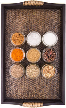 Sugar and spices in a wicker tray