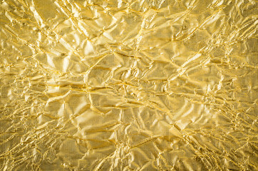 gold paper crumpled texture background