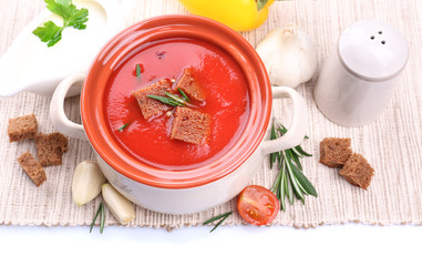 Tasty tomato soup and vegetables, isolated on white