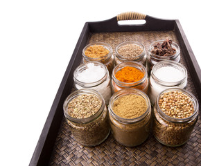 Sugar and spices in a wicker tray