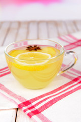 Healthy ginger tea with lemon and honey on table close-up