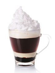 Glass of coffee  with cream and chocolate, isolated on white
