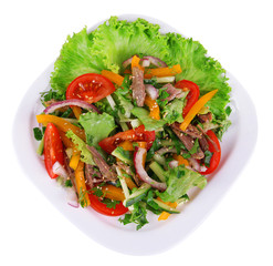 Beef salad on plate isolated on white