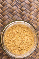 Korma powder spice over a wicker background 