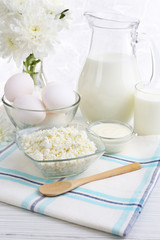 Tasty dairy products on wooden table