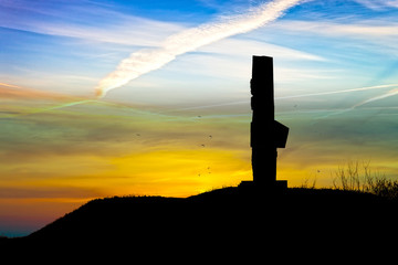Naklejka premium Westerplatte monument silhouetted against the sunset in Gdansk