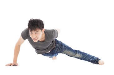 confident young man make push-ups by single hand