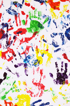 colorful handprints on the white background
