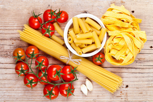 uncooked pasta with tomatoes