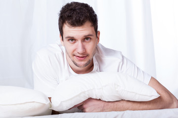 Fototapeta premium Handsome man in bed