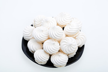 French vanilla meringue cookies on white background
