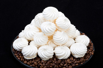 French vanilla meringue cookies and  coffee beans