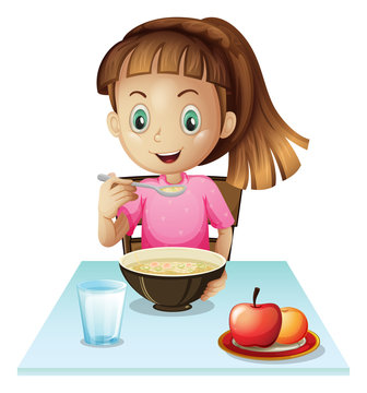 A girl eating breakfast