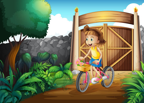 A child biking at the yard