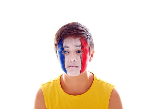 french flag painted on boy's face