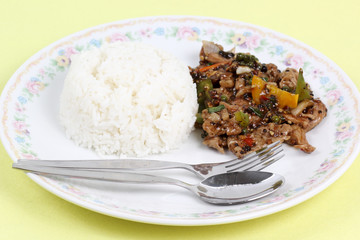 Stir fried beef with black hot pepper and steam rice