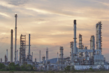 Oil refinery at twilight sky.