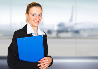 attractive young businesswoman portrait in the airport