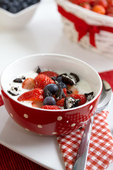 Fresh strawberries with yoghurt for breakfast