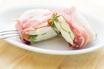 Tomino cheese with bacon