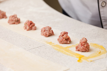 chef making ravioli