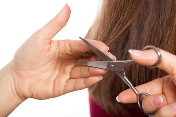 Hairdresser cutting ends