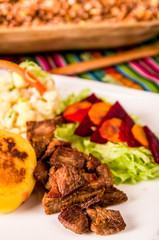 fritada, fried pork, traditional ecuatorian dish.