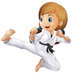 A young girl doing karate © GraphicsRF