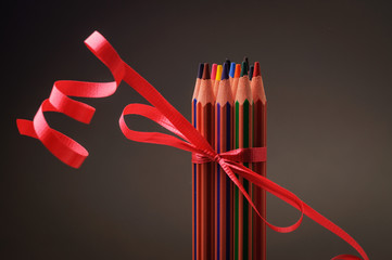Coloring pencils with a red bow