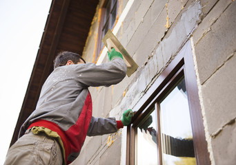Man plastering
