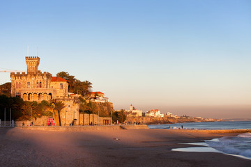 Tamariz Beach in Estoril at Sunset - obrazy, fototapety, plakaty