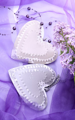 Naklejka premium Valentine metal heart with flowers of lilac