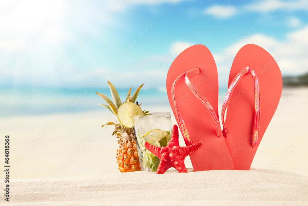 Wall mural Summer beach with red sandals and shells