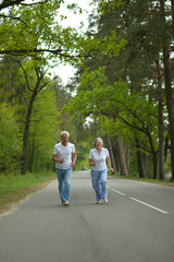 Fototapeta na wymiar Senior couple run